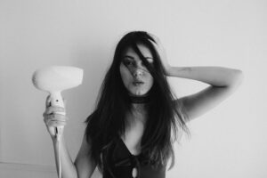 Women using blow dryer